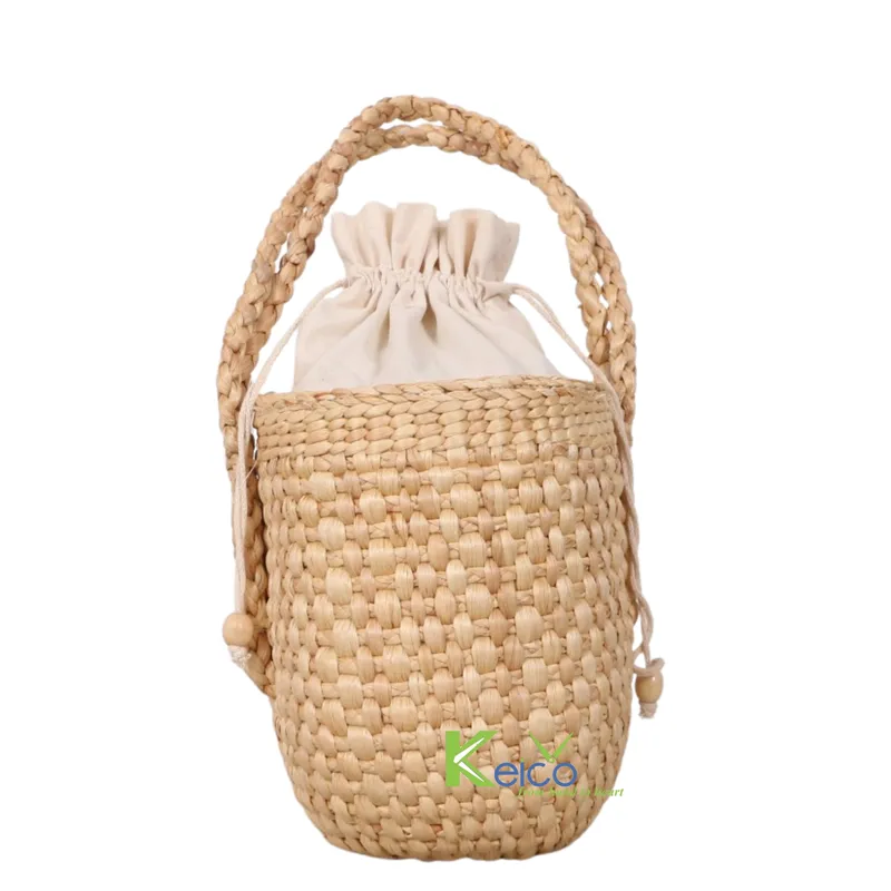 Rattan Export Graziosa borsa in giacinto d'acqua con manico e interno in lino bianco per bambine dal Vietnam - REX-K2310302-2-1