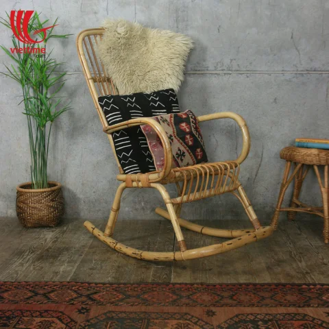 Relaxing With Little SeeSaw Rattan chair