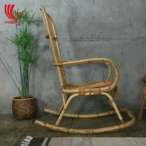 Relaxing With Little SeeSaw Rattan chair
