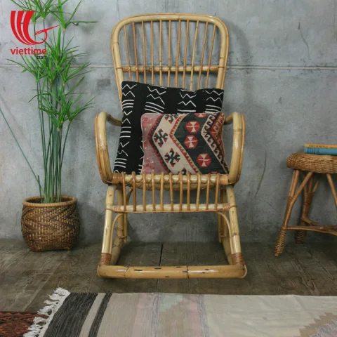 Relaxing With Little SeeSaw Rattan chair