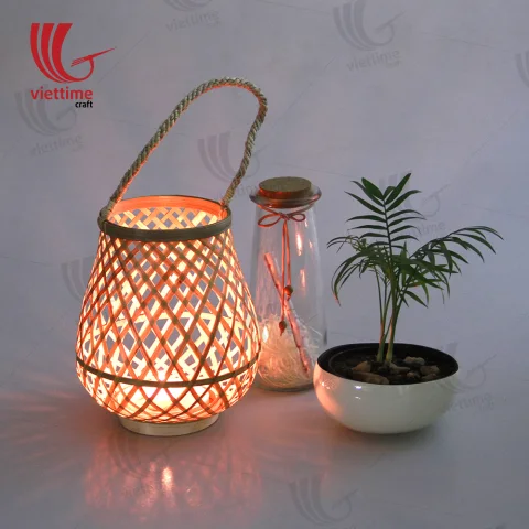Hanging Woven Bamboo Lantern In Garden